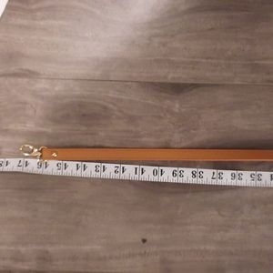 Tan crossbody adjustable strap